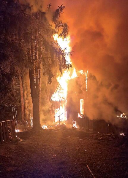 ENGULFED Fire consumes a house on Spring Street in Livingston Manor on the evening of Aug. 27.