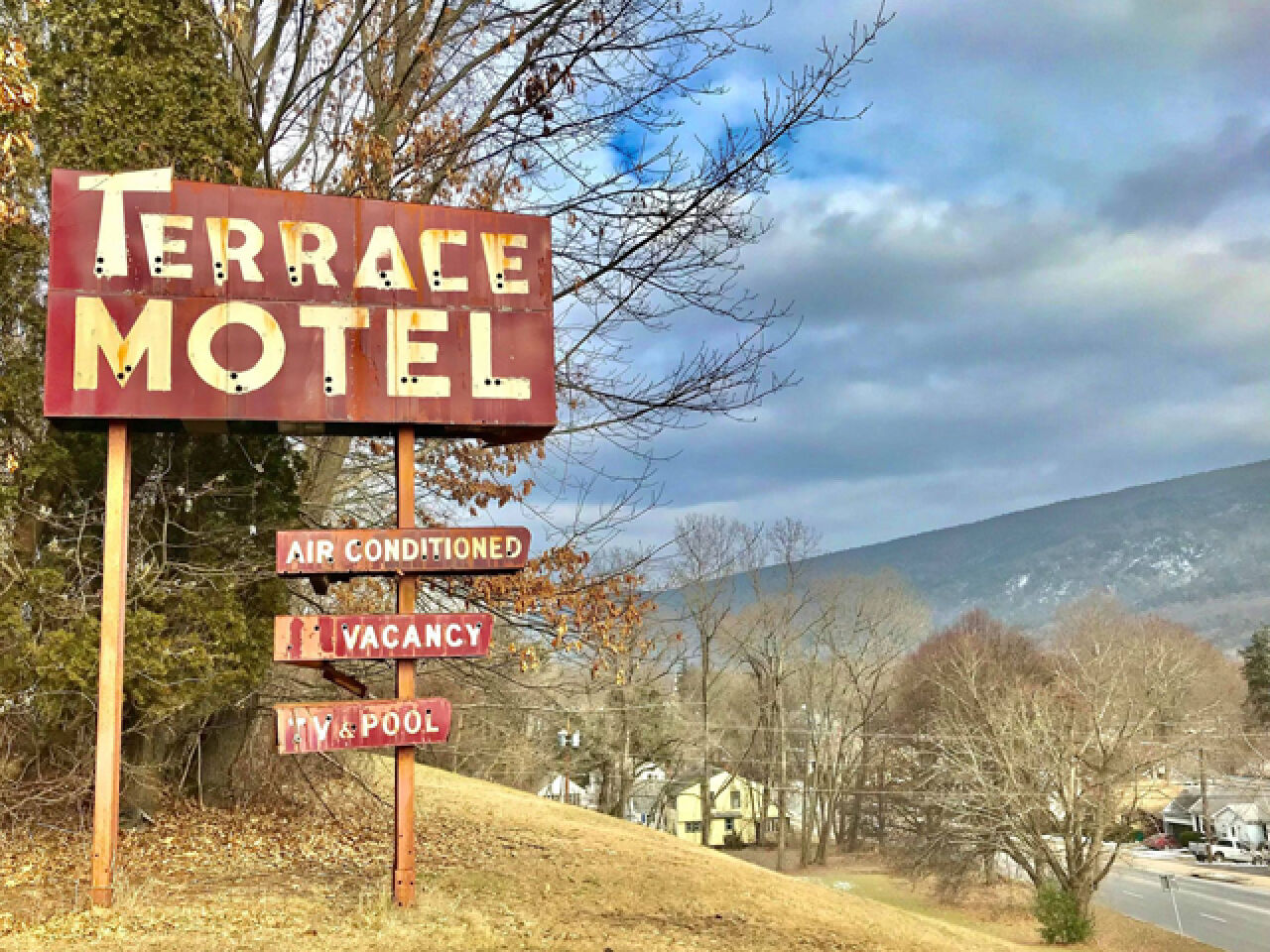 Iconic, Crumbling Terrace Motel Sells